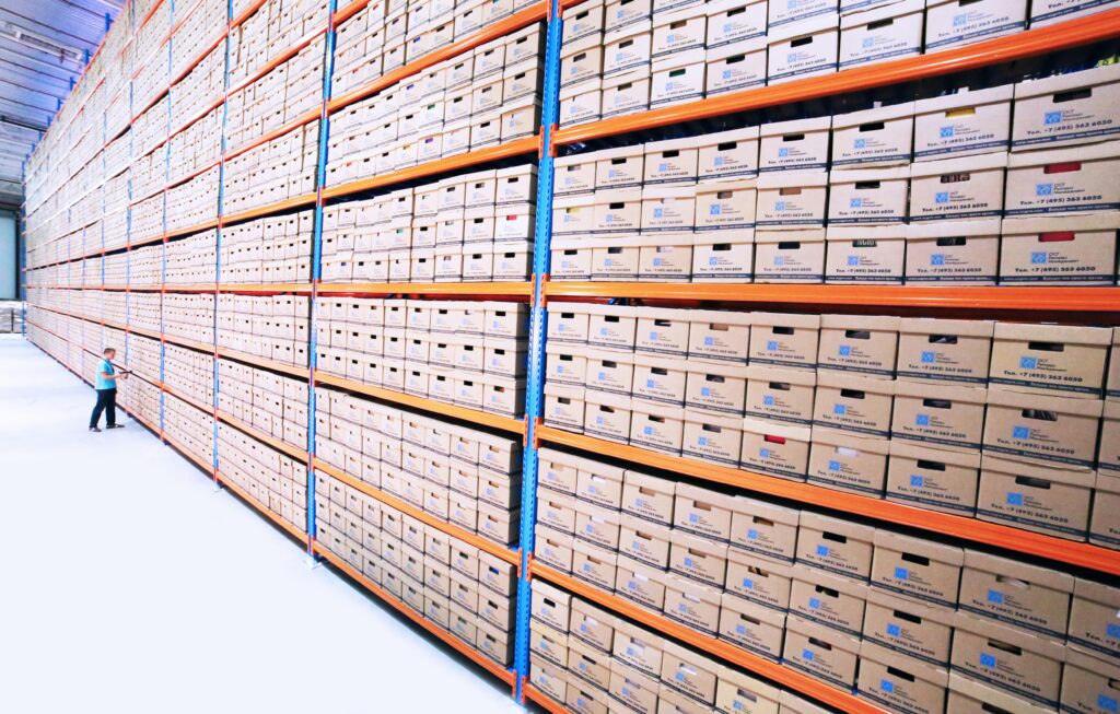 Warehouse slotting optimization with organized storage racks and labeled inventory boxes for faster access and flow