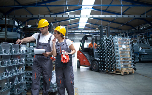 Factory workers checking quality of products