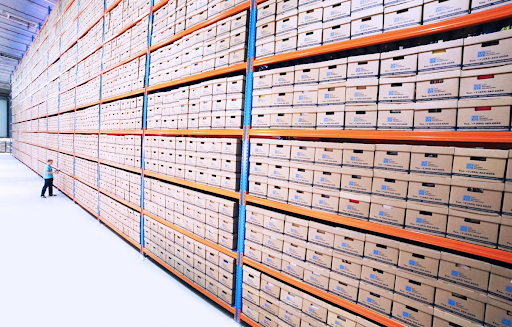 Warehouse slotting optimization with organized storage racks and labeled inventory boxes
