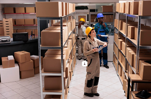 Warehouse workers managing inventory