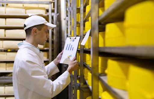 Warehouse worker inspecting inventory