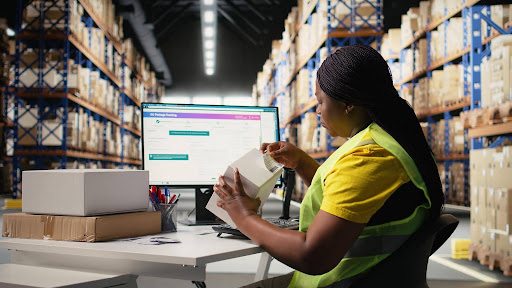 Warehouse worker scanning a package